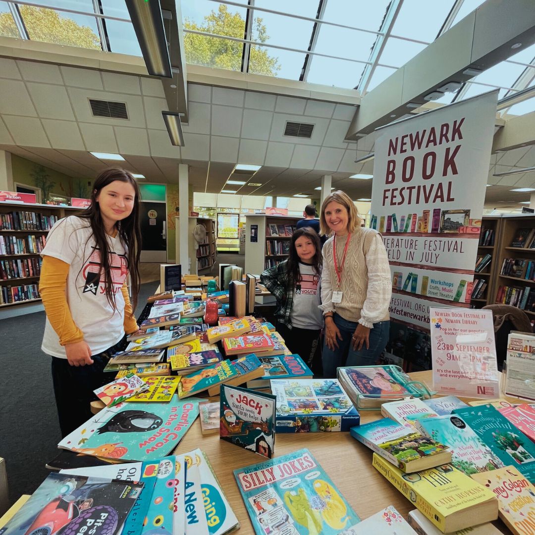 Newark Book Festival Young Ambassadors at a Book Swap Event at Newark Library