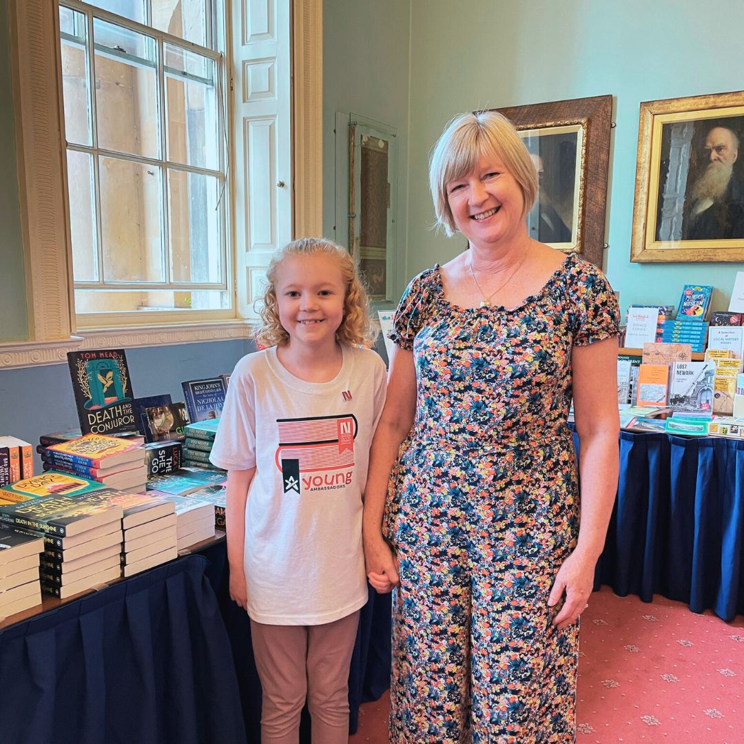 Newark Book Festival Young Ambassador helping at the Festival Book Shop